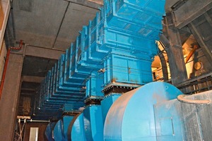 6 The central air suction duct on the grate cooler with integrated silencer for the cooling fans