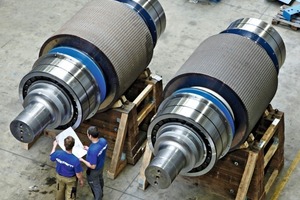 2 Each roll consisting of a core, tire and 2 self-aligning roller bearings has a diameter of 1800 mm and weighs 52 700 kg. The bearings have a bore diameter of 850 mm and weigh 2900 kg