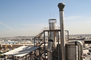 The plant is sur­rounded by the city in all directions