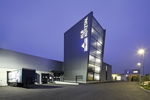 The new mixing tower is the conspicuous central feature of the KLB building