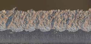 5 The base material and hard facing are clearly visible at the cut edge