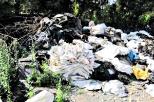 4 Coarse plastic m­a-t­erial, rejected sandals, whole car and truck tyres, cycle tyres and shredded tyres for co-processing in the HOTDISCTM at the Vasavadatta Cements plant