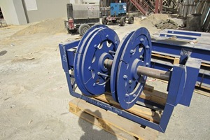 2 A new bottom castor for the bucket elevator is ready for installation