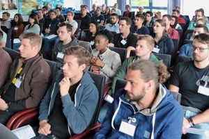 1 Some 45 students listened attentively to the speakers’ presentations