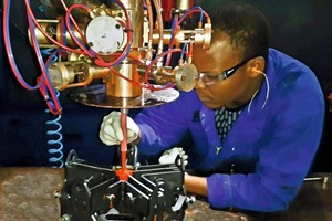 2 The work cell combines all the elements necessary to generate mixed, colored urethane with the forming and curing process