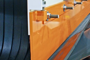 1 The new wear liner is bolted outside the chute wall, eliminating confined space entry for maintenance