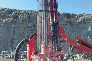 Safety first: Sandvik Leopard DI550 with safety cage at the drill mount