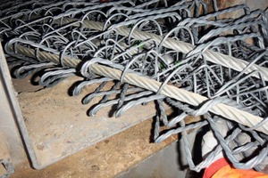 4 The folded safety net is brought in through the riser duct hatch