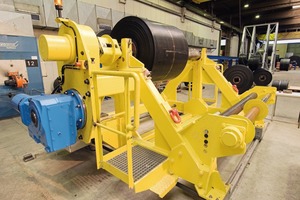 2 Automated belt punch at Aumund works, Rheinberg/Germany, and Aumund clamping device on site