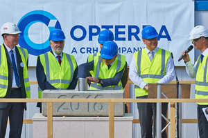 Inserting the traditional “time capsule” at the cornerstone-setting ceremony