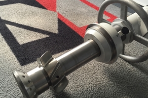 2 An NGZ replica burner (left) and installed in an annular shaft kiln in Canada (right)