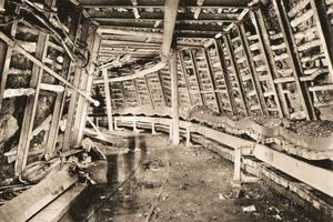 Historical images of the curved steel plate conveyor and railway wagon tippler