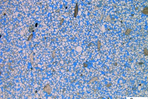 5 LM image of the thin section of the KS- sample impregnated with blue resin a) 10x magnification b) 100x magnification