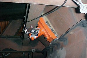 5 A piston vibrator should be installed on a steel channel mounted outside of the chute or vessel