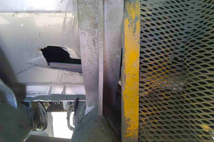 3 The large hole and the warped grate indicate the extreme heat emitted by the system